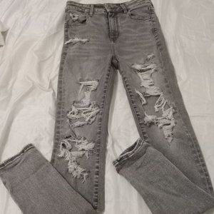 Black distressed AE jeggings